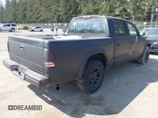 2004 Dodge Dakota SLT with VIN 1D7HL48N44S671513, listed as a IAAI auction lot 42098169 with 189,177 mi miles. Bid and sale history available at carsss.com. Image 4.