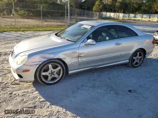 2003 Mercedes-Benz CLK-Class 5.0L with VIN WDBTJ75JX3F052823, listed as a Copart auction lot 87321334 with 132,774 mi miles and Salvage Title. Bid and sale history available at carsss.com. Image 1.