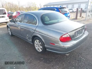 2003 Jaguar S-Type with VIN SAJEA01T23FM93839, listed as a IAAI auction lot 41891973 with 153,761 mi miles and . Bid and sale history available at DreamBid. Image 3.
