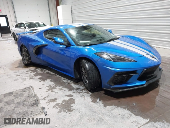 2025 Chevrolet Corvette 1LT with VIN 1G1YA2D42S5105159, listed as a IAAI auction lot 41339189 with 877 mi miles. Bid and sale history available at carsss.com. Image 1.