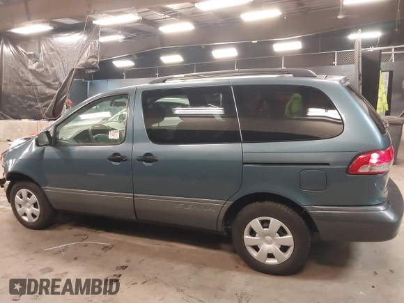 2003 Toyota Sienna CE with VIN 4T3ZF19C03U510244, listed as a IAAI auction lot 41441599 with 126,030 mi miles. Bid and sale history available at carsss.com. Image 14.