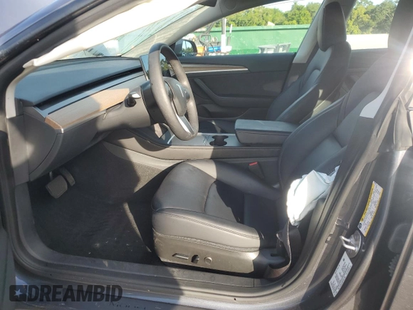 2023 Tesla Model 3 z VIN 5YJ3E1EA6PF621759, wystawiony jako Copart lot #63669045 z przebiegiem 20 094 mil mil oraz Szkoda całkowita • Salvage title. Historia ofert i sprzedaży dostępna na DreamBid. Obrazek 7.