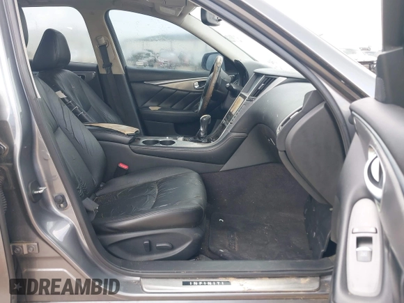 2014 Infiniti Q50 Premium with VIN JN1BV7APXEM681978, listed as a IAAI auction lot 42681718 with 138,857 mi miles and . Bid and sale history available at DreamBid. Image 5.