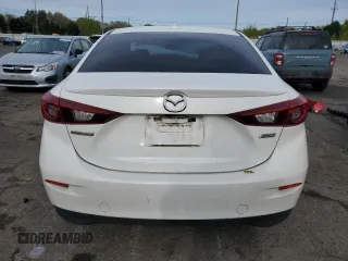 2016 Mazda 3 i Touring z VIN JM1BM1W70G1299548, wystawiony jako Copart lot #52575085 z przebiegiem 136 964 mil mil oraz Szkoda całkowita • Salvage title. Historia ofert i sprzedaży dostępna na DreamBid. Obrazek 6.