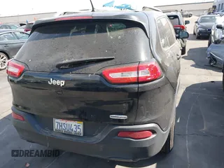 2015 Jeep Cherokee Latitude with VIN 1C4PJLCB9FW627909, listed as a IAAI auction lot 42034667 with 131,739 mi miles and . Bid and sale history available at carsss.com. Image 17.