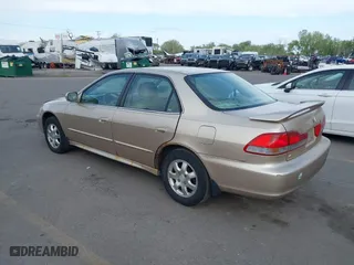 2002 Honda Accord Sdn EX with VIN 1HGCG56602A058660, listed as a IAAI auction lot 42117269 with 179,405 mi miles. Bid and sale history available at carsss.com. Image 3.