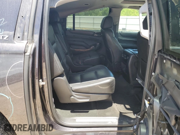 2015 Chevrolet Suburban LTZ with VIN 1GNSCKKC7FR552173, listed as a Copart auction lot 63483995 with 250,564 mi miles and Salvage title. Bid and sale history available at DreamBid. Image 11.
