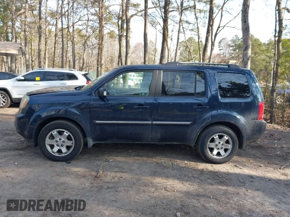 2009 Honda Pilot Touring with VIN 5FNYF48939B007471, listed as a IAAI auction lot 41683495 with 189,806 mi miles and . Bid and sale history available at carsss.com. Image 14.