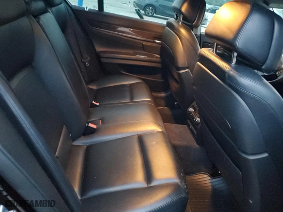 2013 BMW 7 Series 750i xDrive with VIN WBAYB6C55DC998073, listed as a Copart auction lot 67552004 with 0 mi miles and Salvage Title. Bid and sale history available at carsss.com. Image 10.