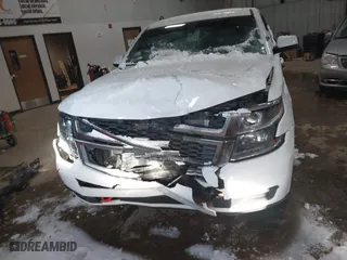 2015 Chevrolet Tahoe Commercial with VIN 1GNSK2EC8FR722684, listed as a IAAI auction lot 41553558 with 119,434 mi miles. Bid and sale history available at carsss.com. Image 12.