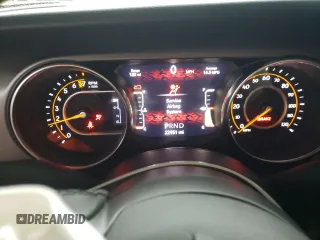 2022 Jeep Wrangler Unlimited Sport S with VIN 1C4HJXDG7NW235385, listed as a Copart auction lot 86088314 with 22,951 mi miles and Salvage Title. Bid and sale history available at carsss.com. Image 9.