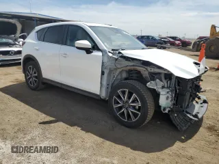 2018 Mazda CX-5 Touring with VIN JM3KFBCM0J0431285, listed as a Copart auction lot 53919695 with 61,745 mi miles and Salvage Title. Bid and sale history available at carsss.com. Image 4.