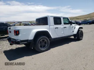 2022 Jeep Gladiator Rubicon z VIN 1C6JJTBG4NL135430, wystawiony jako Copart lot #52581015 z przebiegiem 54 553 mil mil oraz Szkoda całkowita • Salvage title. Historia ofert i sprzedaży dostępna na DreamBid. Obrazek 3.