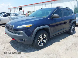 2015 Jeep Cherokee Trailhawk with VIN 1C4PJMBS3FW704622, listed as a IAAI auction lot 42465702 with 96,831 mi miles and . Bid and sale history available at DreamBid. Image 17.