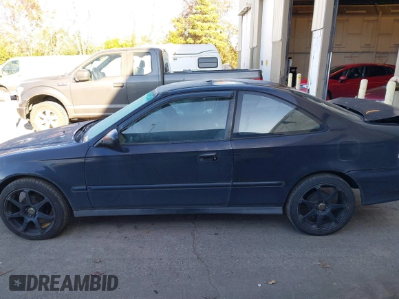 1999 Honda Civic HX with VIN 1HGEJ7120XL038544, listed as a IAAI auction lot 41425202 with 336,033 mi miles. Bid and sale history available at carsss.com. Image 14.
