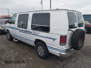 1996 Ford Econoline Cargo with VIN 1FDEE14N7THA03059, listed as a IAAI auction lot 41217045 with 139,435 mi miles and . Bid and sale history available at DreamBid. Image 3.