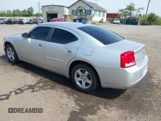 2010 Dodge Charger SXT with VIN 2B3CA3CV9AH311637, listed as a IAAI auction lot 42079657 with 187,683 mi miles. Bid and sale history available at carsss.com. Image 3.