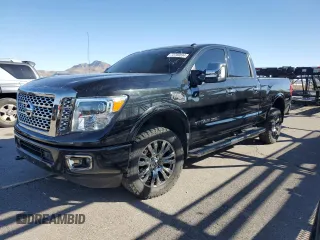 2017 Nissan Titan XD SV with VIN 1N6BA1F43HN567580, listed as a Copart auction lot 72769034 with 97,850 mi miles and Salvage Title. Bid and sale history available at carsss.com. Image 1.