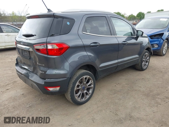 2021 Ford EcoSport Titanium z VIN MAJ6S3KL5MC452064, wystawiony jako IAAI lot #42049689 z przebiegiem 66 056 mil mil oraz . Historia ofert i sprzedaży dostępna na DreamBid. Obrazek 4.