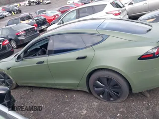 2022 Tesla Model S with VIN 5YJSA1E50NF487306, listed as a IAAI auction lot 41570528 with Not Provided miles and . Bid and sale history available at DreamBid. Image 15.
