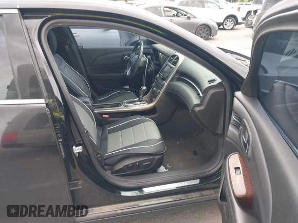2013 Chevrolet Malibu LTZ with VIN 1G11H5SA2DU125573, listed as a IAAI auction lot 42047422 with 165,493 mi miles and . Bid and sale history available at DreamBid. Image 5.
