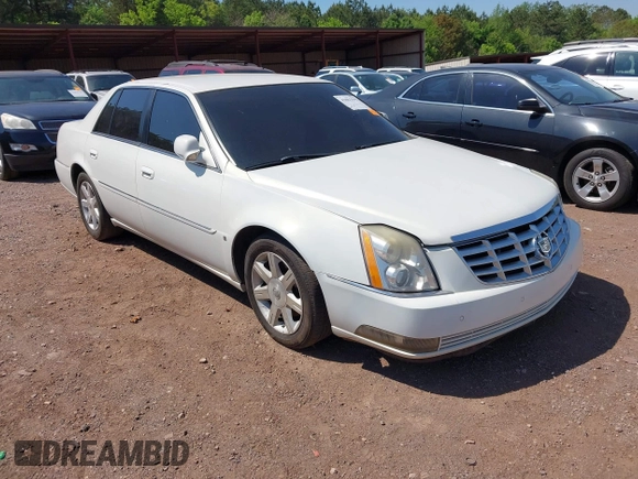 2006 Cadillac DTS w/1SC with VIN 1G6KD57Y36U116528, listed as a IAAI auction lot 42063595 with 128,839 mi miles. Bid and sale history available at carsss.com. Image 1.