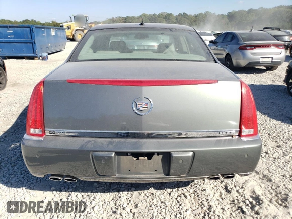2008 Cadillac DTS 1SD z VIN 1G6KD57Y68U140938, wystawiony jako Copart lot #77525974 z przebiegiem 148 132 mil mil oraz Szkoda całkowita • Salvage title. Historia ofert i sprzedaży dostępna na DreamBid. Obrazek 6.