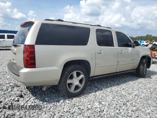 2014 Chevrolet Suburban LTZ with VIN 1GNSKKE76ER176923, listed as a Copart auction lot 64329985 with 246,832 mi miles and Clean title. Bid and sale history available at DreamBid. Image 3.