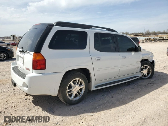 2006 GMC Envoy XL Denali with VIN 1GKES66MX66120332, listed as a Copart auction lot 49632955 with 100,580 mi miles and Salvage Title. Bid and sale history available at carsss.com. Image 3.