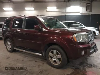 2009 Honda Pilot EX-L with VIN 5FNYF48569B021586, listed as a IAAI auction lot 41609721 with 291,598 mi miles. Bid and sale history available at carsss.com. Image 1.