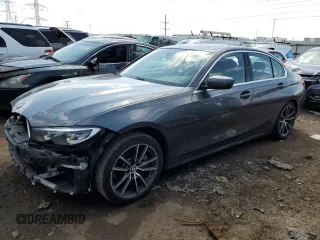 2019 BMW 3 Series 330i with VIN WBA5R1C55KAJ98853, listed as a Copart auction lot 50699315 with 101,110 mi miles and Salvage title. Bid and sale history available at DreamBid. Image 1.