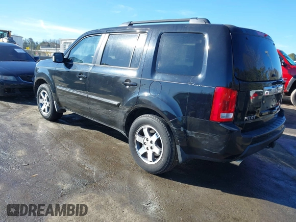2010 Honda Pilot Touring with VIN 5FNYF4H95AB030531, listed as a IAAI auction lot 41441088 with 274,185 mi miles and . Bid and sale history available at carsss.com. Image 3.
