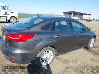 2016 Ford Focus SE with VIN 1FADP3F21GL212718, listed as a IAAI auction lot 41785985 with 101,198 mi miles. Bid and sale history available at carsss.com. Image 4.