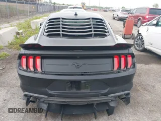 2021 Ford Mustang EcoBoost z VIN 1FA6P8TH7M5132841, wystawiony jako IAAI lot #42364830 z przebiegiem 22 331 mil mil oraz . Historia ofert i sprzedaży dostępna na DreamBid. Obrazek 16.