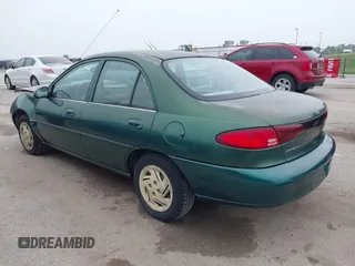 1999 Ford Escort LX z VIN 1FAFP10P1XW230023, wystawiony jako IAAI lot #42486934 z przebiegiem 41 468 mil mil oraz . Historia ofert i sprzedaży dostępna na DreamBid. Obrazek 3.