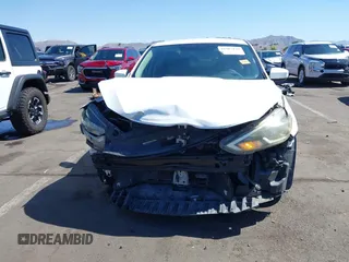 2019 Nissan Sentra S with VIN 3N1AB7AP8KY323629, listed as a IAAI auction lot 42207129 with 77,265 mi miles and . Bid and sale history available at DreamBid. Image 6.