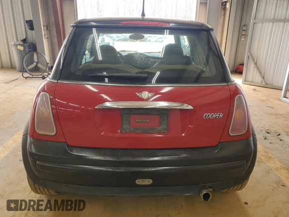 2004 MINI Hardtop with VIN WMWRC33474TJ58626, listed as a Copart auction lot 49226175 with 116,115 mi miles and Salvage Title. Bid and sale history available at DreamBid. Image 6.