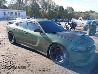 2019 Dodge Charger Scat Pack with VIN 2C3CDXGJ4KH572619, listed as a IAAI auction lot 40973015 with 40,148 mi miles and . Bid and sale history available at DreamBid. Image 1.
