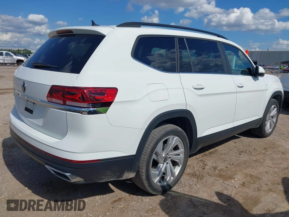 2021 Volkswagen Atlas SE z VIN 1V2WR2CA9MC585700, wystawiony jako IAAI lot #42234502 z przebiegiem 46 040 mil mil oraz . Historia ofert i sprzedaży dostępna na DreamBid. Obrazek 4.