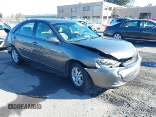 2004 Toyota Camry LE with VIN 4T1BF30K94U577260, listed as a IAAI auction lot 41906287 with 68,499 mi miles. Bid and sale history available at carsss.com. Image 1.