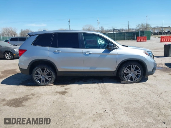 2021 Honda Passport EX-L with VIN 5FNYF8H51MB024752, listed as a IAAI auction lot 41858129 with 77,545 mi miles and . Bid and sale history available at DreamBid. Image 14.