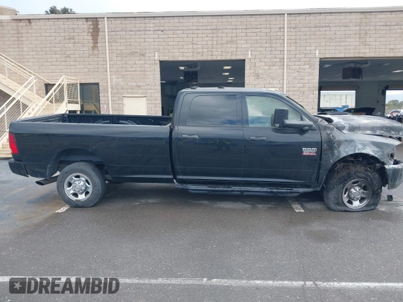 2012 Ram 2500 ST z VIN 3C6UD5HL0CG181853, wystawiony jako IAAI lot #41603748 z przebiegiem Nie podano mil oraz . Historia ofert i sprzedaży dostępna na DreamBid. Obrazek 13.
