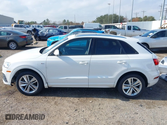 2018 Audi Q3 Premium with VIN WA1BCCFS8JR001155, listed as a IAAI auction lot 41157028 with 83,769 mi miles. Bid and sale history available at carsss.com. Image 14.