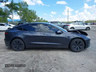 2025 Tesla Model 3 Long Range with VIN 5YJ3E1EA9SF897555, listed as a IAAI auction lot 41886716 with 6,757 mi miles and . Bid and sale history available at carsss.com. Image 14.
