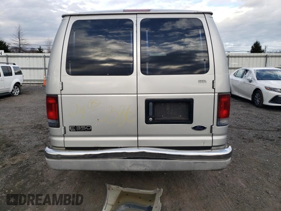 2002 Ford Econoline Passenger XL with VIN 1FBSS31L12HA34583, listed as a Copart auction lot 86967804 with 205,413 mi miles and Salvage title. Bid and sale history available at DreamBid. Image 6.