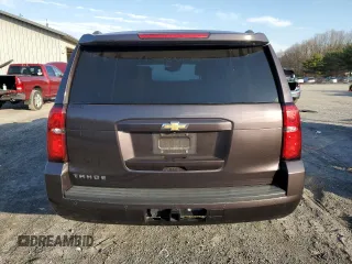 2016 Chevrolet Tahoe LT z VIN 1GNSKBKCXGR365465, wystawiony jako Copart lot #49716705 z przebiegiem Nie podano mil oraz Szkoda całkowita • Salvage title. Historia ofert i sprzedaży dostępna na DreamBid. Obrazek 6.