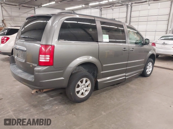 2010 Chrysler Town & Country Touring Plus with VIN 2A4RR8D17AR393916, listed as a IAAI auction lot 42171114 with 123,741 mi miles. Bid and sale history available at carsss.com. Image 4.