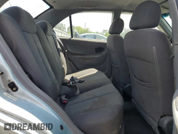 2004 Hyundai Accent GL z VIN KMHCG45C94U574027, wystawiony jako Copart lot #57463905 z przebiegiem 139 595 mil mil oraz Szkoda całkowita • Salvage title. Historia ofert i sprzedaży dostępna na DreamBid. Obrazek 10.