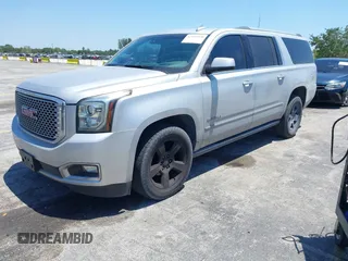 2016 GMC Yukon XL Denali with VIN 1GKS2HKJXGR423556, listed as a IAAI auction lot 42145970 with 118,436 mi miles. Bid and sale history available at carsss.com. Image 2.