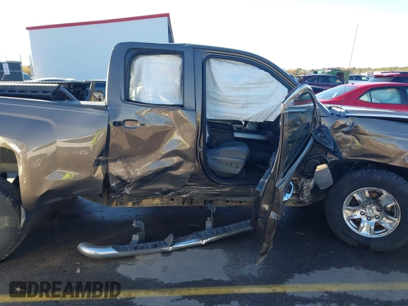 2014 Chevrolet Silverado 1500 LT with VIN 1GCRCREH5EZ165367, listed as a IAAI auction lot 41076729 with 130,425 mi miles and . Bid and sale history available at DreamBid. Image 6.